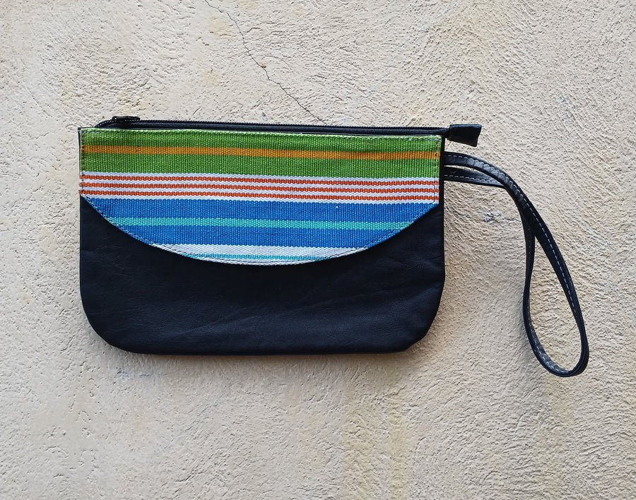 Upcycled leather clutch with colorful Mayan fabrics