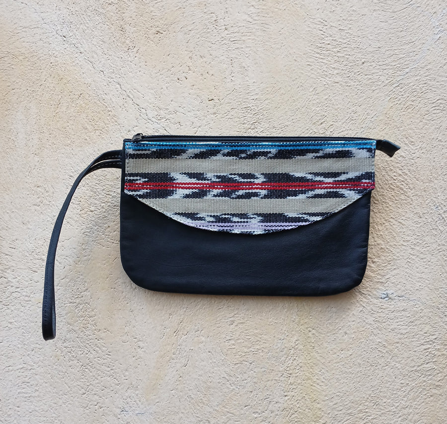 Upcycled leather clutch with colorful Mayan fabrics