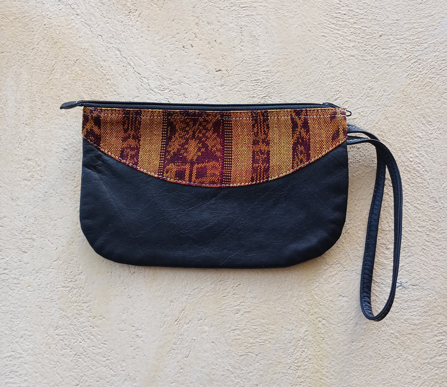 Upcycled leather clutch with colorful Mayan fabrics