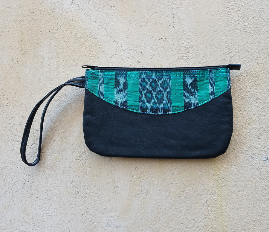 Upcycled leather clutch with colorful Mayan fabrics