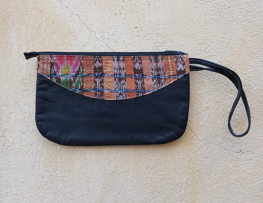 Upcycled leather clutch with colorful Mayan fabrics