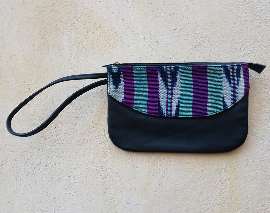 Upcycled leather clutch with colorful Mayan fabrics