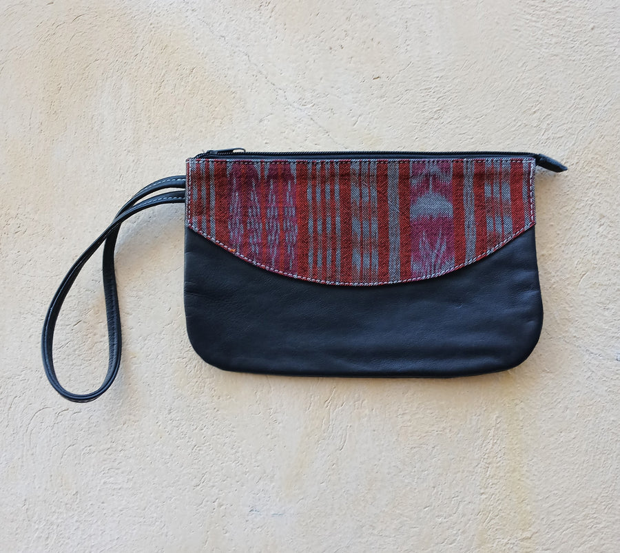 Upcycled leather clutch with colorful Mayan fabrics